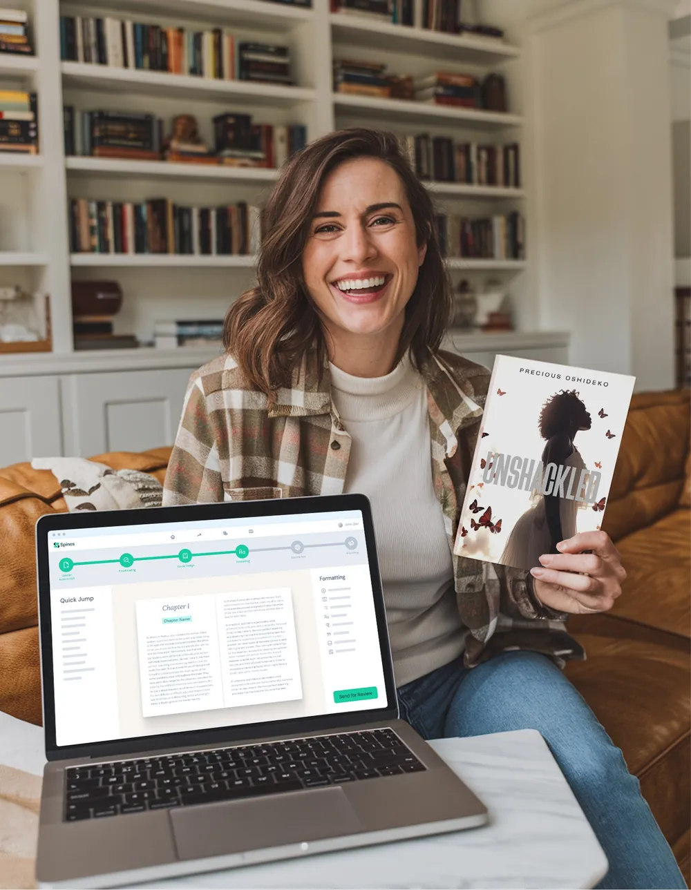 Author holding her published book